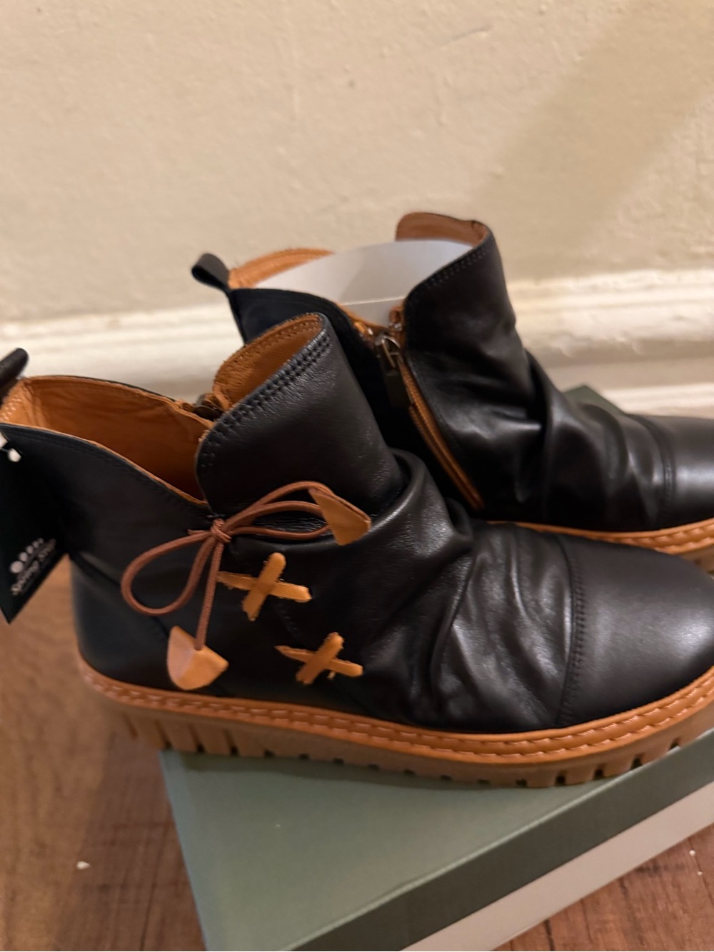 Black Leather Ankle Boots with Tan Accents